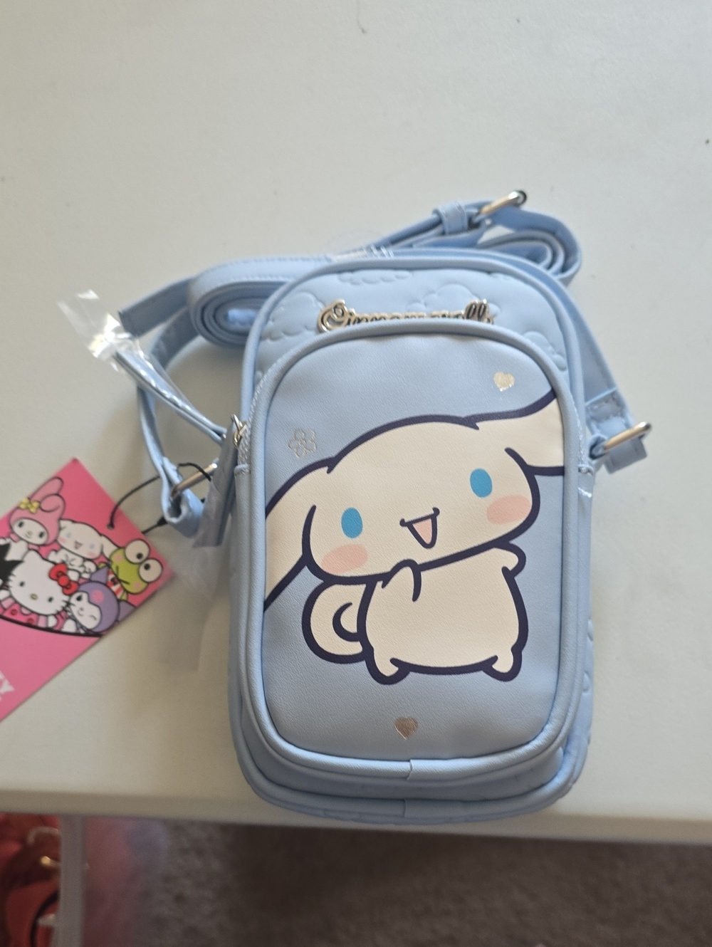 Primark pastel light blue character-print crossbody bag